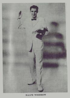 Ralph Woodrow, in white suit holding a bible
